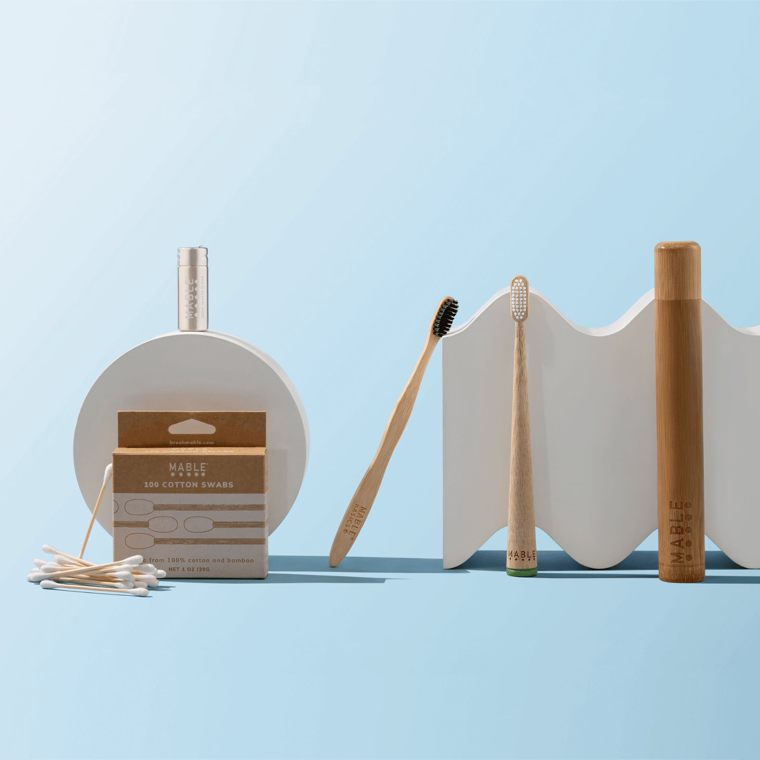 MABLE-Eco_Bathroom_Set_4_1 is self standing brush_1 MABLE basic brush_One 100-Pack of Bamboo Cotton Swabs_One Bamboo Travel Case